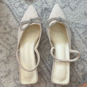 Nude suede kitten heels with sparkly bow. Never been worn size 38